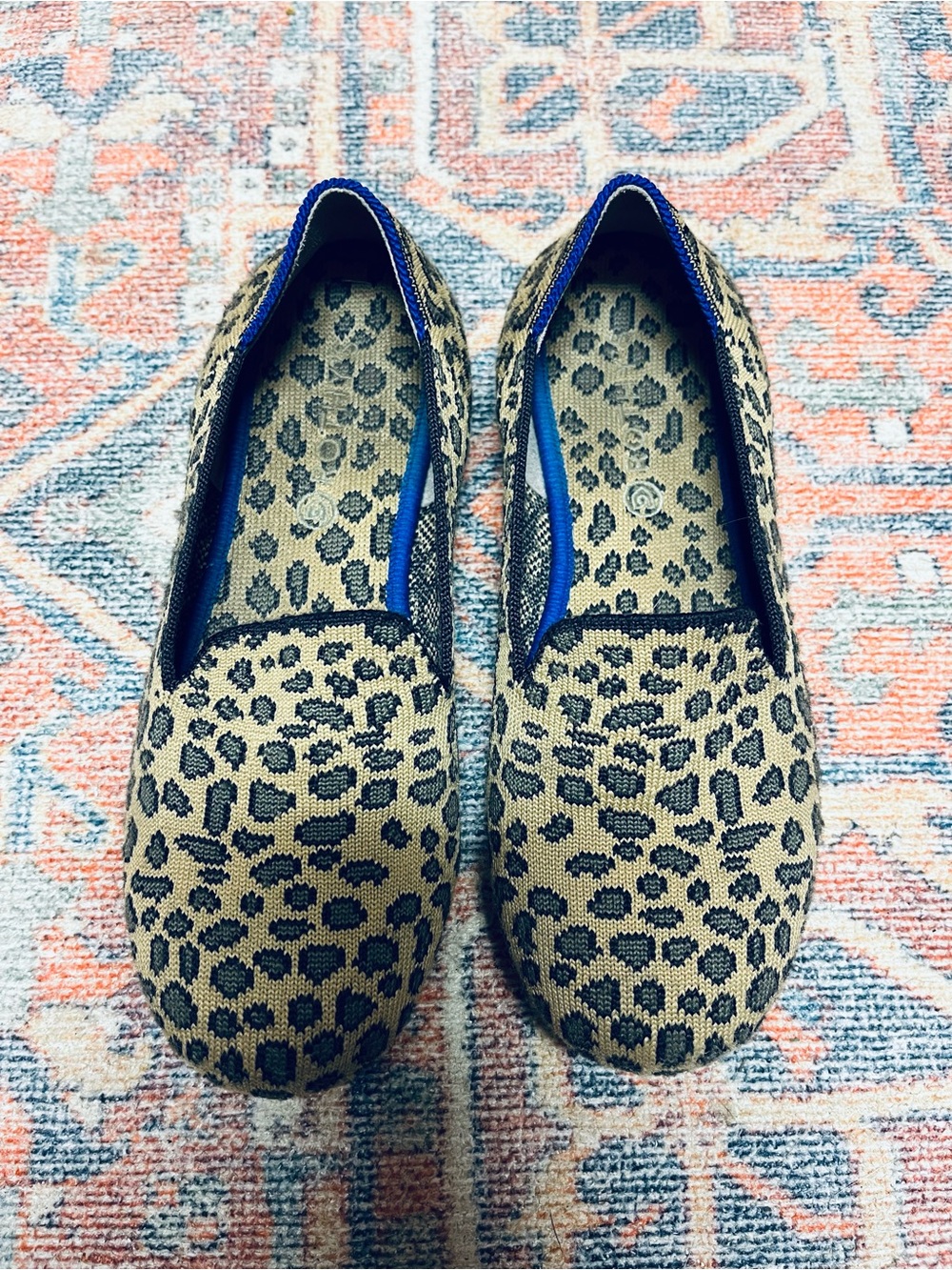 Rothy's Kids Leopard-Print Slip-Ons in Tan and Black with Blue Trim